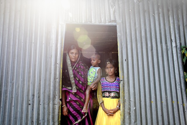 After recovering from her physical injuries, Rahela left Savar, moving back to her village in Manikganj with her two daughters, Limia (8) and Liza (2). The three live together in a house next to Rahela’s parents.