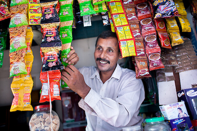 “My wife and I work as a team,” said Ahad, who tends to the grocery store while his wife works on tailoring orders. “The money we make now may be less than what we earned when we both worked at factories, but we are happier. We are always looking for new and better ways to increase our income.”