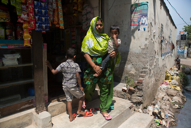 Parveen now runs a small shop with which she supports her young family.