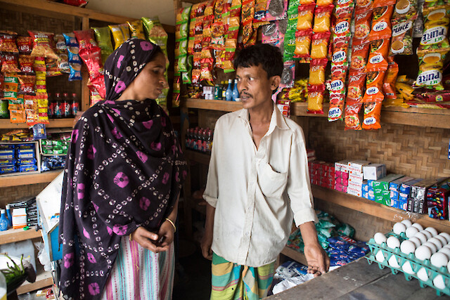 Firoza and her husband Nazibur Rahman work as a team to manage a grocery shop and tea stall.