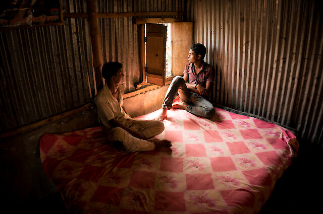 Rezaul Hossain (right), originally from Manikganj, began working for New Wave Style on the third floor of Rana Plaza in 2012.